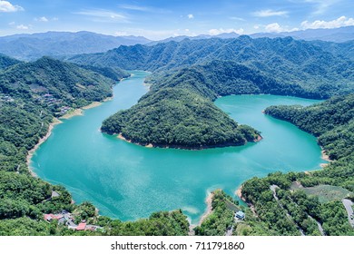 Thousand Island Lake Aerial Photography - Walking Catfish Head birds eye view use the drone photography with morning blue bright sky, shot in Feitsui Dam in Shiding District, New Taipei, Taiwan.
