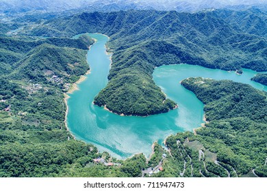 Thousand Island Lake Aerial Photography - Walking Catfish Head birds eye view use the drone photography with morning blue bright sky, shot in Feitsui Dam in Shiding District, New Taipei, Taiwan.