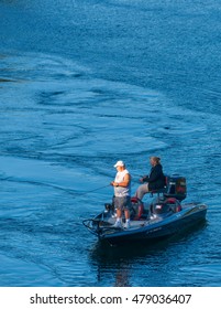 Thousand Islands, Ontario - August 27. 2016: Mature Couple Fishing From A Well Appointed Fishing Boat