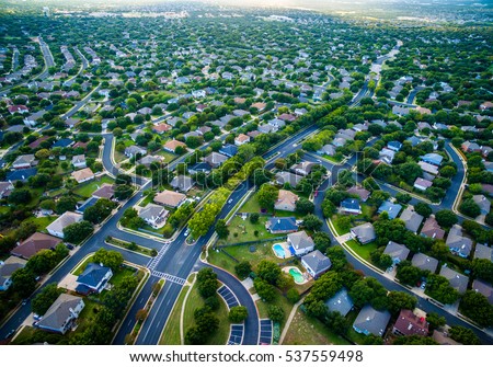 Thousands of houses aerial birds eye view suburb housing development new neighborhood in Austin , Texas , USA modern architecture and design