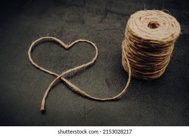 Thread From Jute Twine Forms A Heart	
