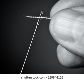 Thread the needle. - Shutterstock ID 129944126