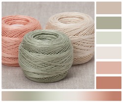 Thread Spools On Natural Linen Background. Palette With Complimentary Colour Swatches.