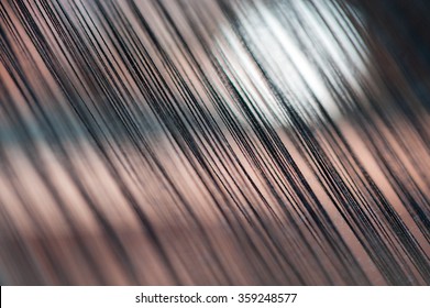 Thread from weaving machine ,Abstract background - selective focus.