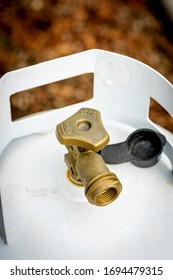 Threads And Handle Mounted On The Top Of A Propane Tank To Be Used For A BBQ