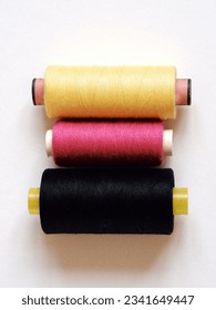 Threads. A set of colored threads. Threads with a needle. sewing thread