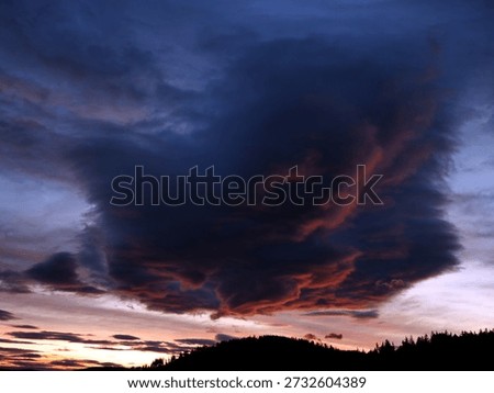 threatening clouds over the mountains