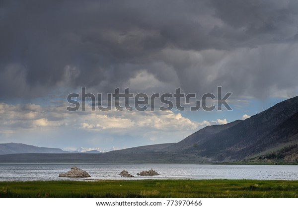 Threatening storm clouds are\
hanging low over mono lake, near the town of Lee Vining, in the\
Sierra Nevada mountain range. Sierra Nevadas, Eastern California,\
USA.