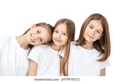 Three 10-11 year old girls friends laugh and smile at the camera. Close-up portrait on a white studio background. Happy children. - Powered by Shutterstock