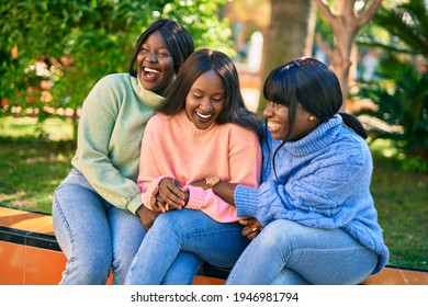 Three African American Friends Smiling Happy Standing At The Park.