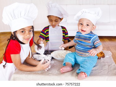 Three African American Kids Playing With Flour