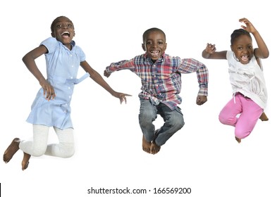 Three African Kids Jumping High, Studio Shot