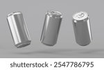 Three aluminum cans isolated on a grey background