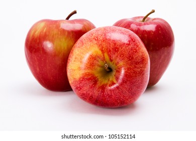 Three, appetizing apples isolated on white background.