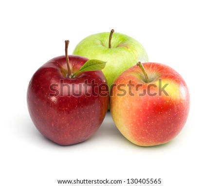 Three apples in different colors, isolated on white background
