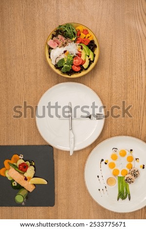 three balanced and nutritious meals breakfast, lunch, and dinner plate and utensils arranged like a clock, symbolizing meal times themes of healthy eating, wellness, and time management in nutrition