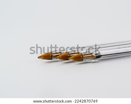 three  ball tip biro pens isolated on a white background