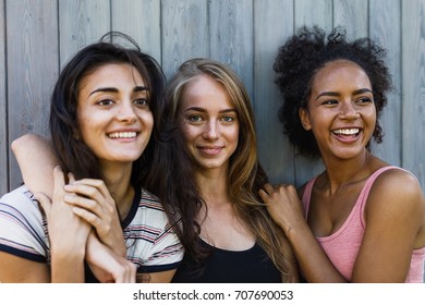 Three Beautiful Smiling Women Standing Together Stock Photo 707690053 ...
