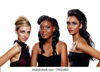 Three beautiful women of different races with different makeup and fashion hairstyles over white background. Focus on the blond
