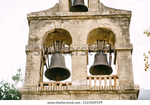 Three bells on the bell tower of the Church of\
the Nativity of the Virgin in\
Prcanj