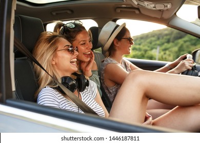 Three Best Female Friends Travel Together.They Drives A Car And Making Fun.Summer Vacation.