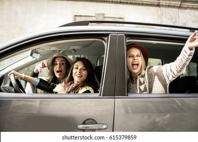 Three Best Friends Riding In The Car And I Say Hi. Looking At Camera.