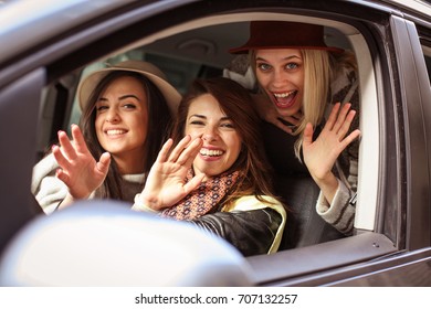 Three Best Friends Riding In The Car And I Say Hi. Looking At Camera.