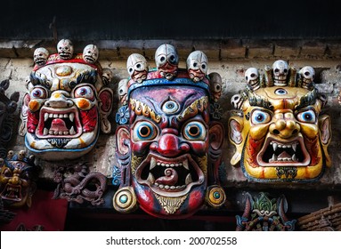 Three Bhairab masks on the wall in the shop in Bhaktapur, Kathmandu valley, Nepal   