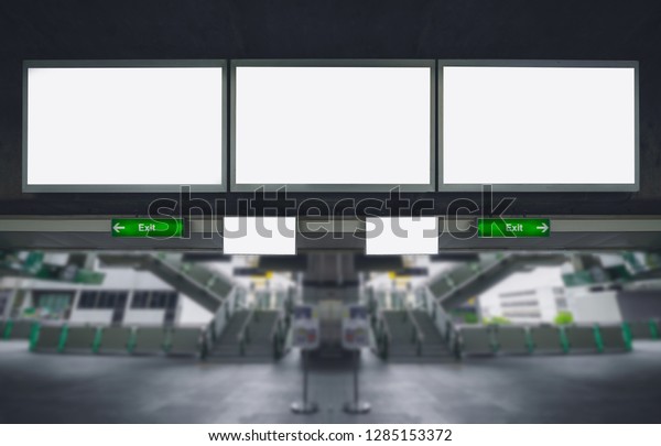 three big blank billboard advertising white LED\
screen horizontal poster hang over on metro station sky train for\
design text template promotion new brand display advertisement\
indoor ads mock up.