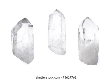 Three Big Natural Quartz Crystals Isolated On White.