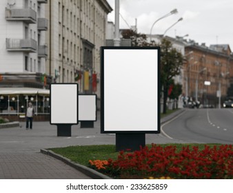 Three Blank Billboards On City Street. Shallow Depth Of Field. Clipping Path.