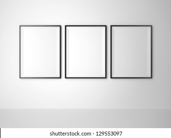 three blank frame on white wall