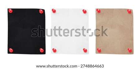 Three blank square paper sheets in black white and brown pinned with red thumbtacks concept of variety and options