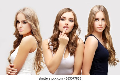 Three blondes.Beauty portrait of a young girls. - Shutterstock ID 563097853