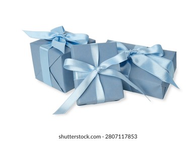 Three blue gift boxes with light blue satin ribbons isolated on white

A group of three beautifully wrapped gift boxes in matching blue paper, adorned with elegant light blue satin bows and ribbons, isolated on a clean white background. This versatile composition is perfect for various celebrations, including Father's Day, boy baby showers, men's birthdays, Christmas, and corporate gifting promotions.