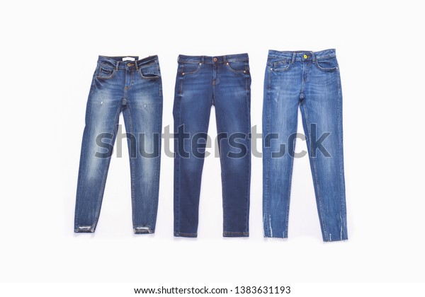 Three Blue Jeans On White Background Stock Photo 1383631193 | Shutterstock