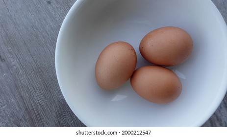 Three Boiled Eggs In A Bowl, Top Down View