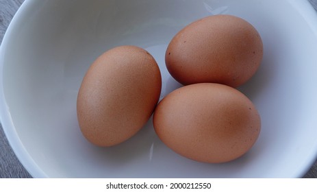 Three Boiled Eggs In A Bowl, Top Down View