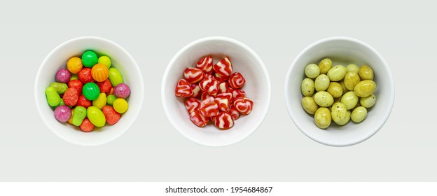 Three Bowls of Assorted Candy in White Background