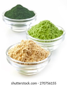 Three Bowls Of Various Superfood Powders