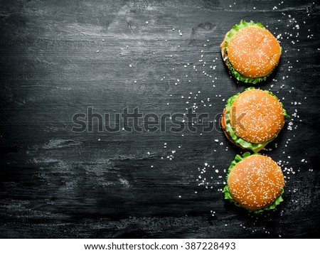 Similar – Image, Stock Photo Bread buns in a basket hanging on a blue wall