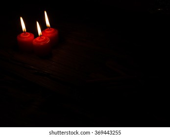 three burning candles 
