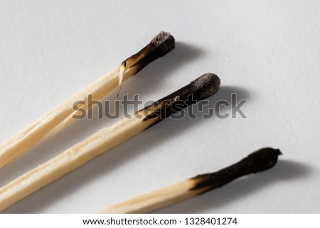 Three Burnt Matches
