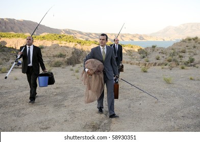 Three business men fishing