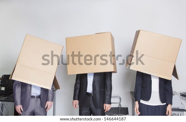 Three Business People Boxes Over Their Stock Photo Edit Now 146644187