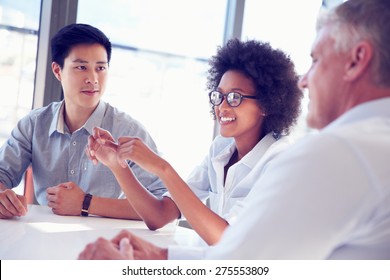Three business professionals working together