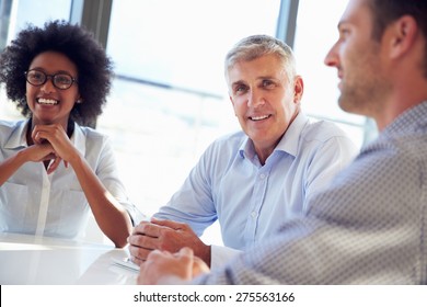 Three Business Professionals Working Together Stock Photo 275563166 ...