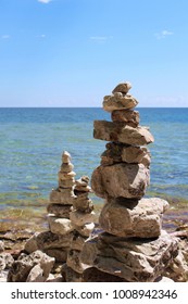 Three Cairns, Rock Totems, On The Rocky Shoreline Of Lake Michigan At Cave Point County Park, Sturgeon Bay, Door County, Wisconsin, USA