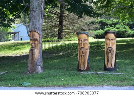 Three Carved Faces