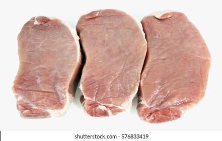 Three Center Cut Pork Chops. Isolated.